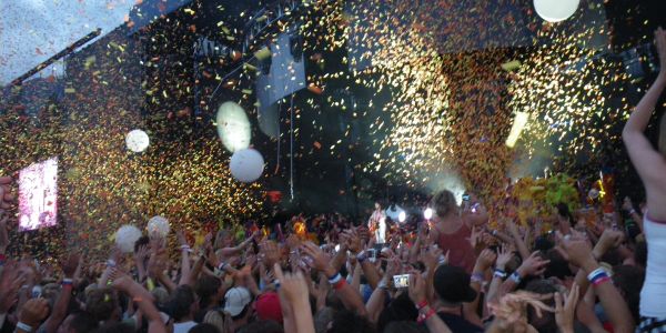 Image of A Crowd Enjoying a musical event.